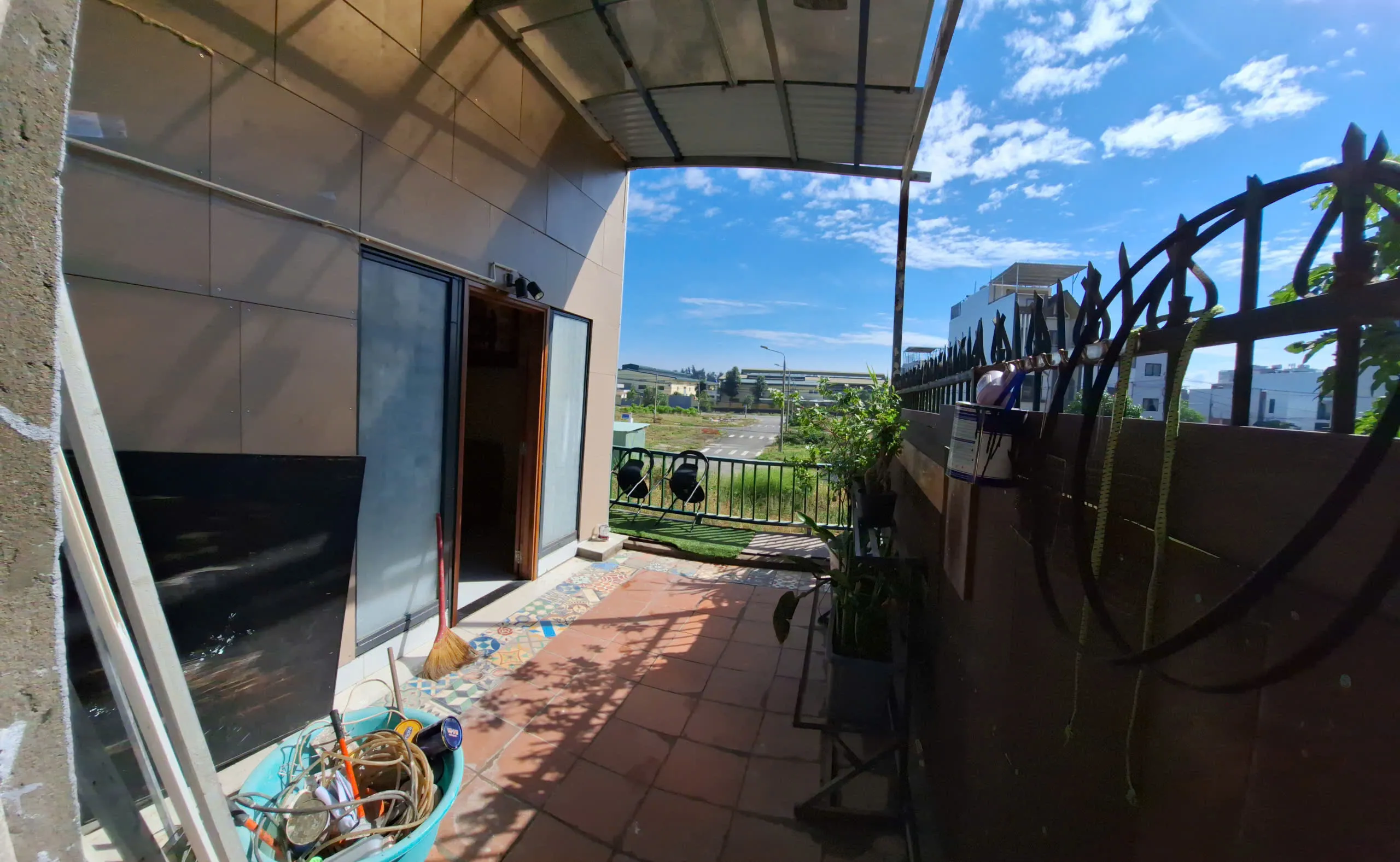 Terrace walkway with terracotta tiles and a roof